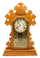 The E. Ingraham Co. Oak Gingerbread Clock.