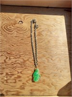 Necklace with green glass pendant