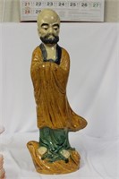 A Large Chinese Pottery Figurine