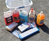 Basket lot of liquid cleaners, charcoal lighter,