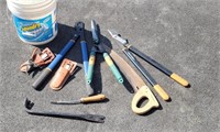 Bucket lot loppers, pry bar, saw, etc.
