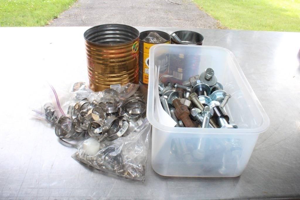 Assortment of hose clamps, heavy bolts, bolts &