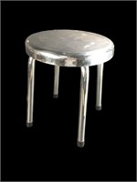 Stainless steel stool.  14" tall, 12" diameter.