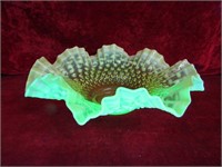 Vintage yellow Vaseline glass ruffled bowl.