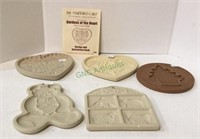 Lot of five clay cookie molds includes the