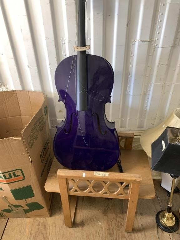 Lot with double sided chair, and a purple cello in