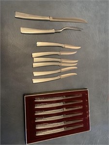 Silver handled steak knives (12) and carving set