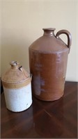 Two earthenware jugs. Damage on both.