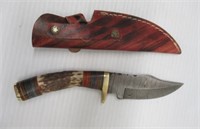 4" Damascus steel fixed blade knife with sheath.