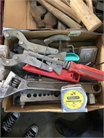 Box with miscellaneous wrenches, tape measure,