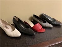 Four pair of ladies closed toe shoes and one open