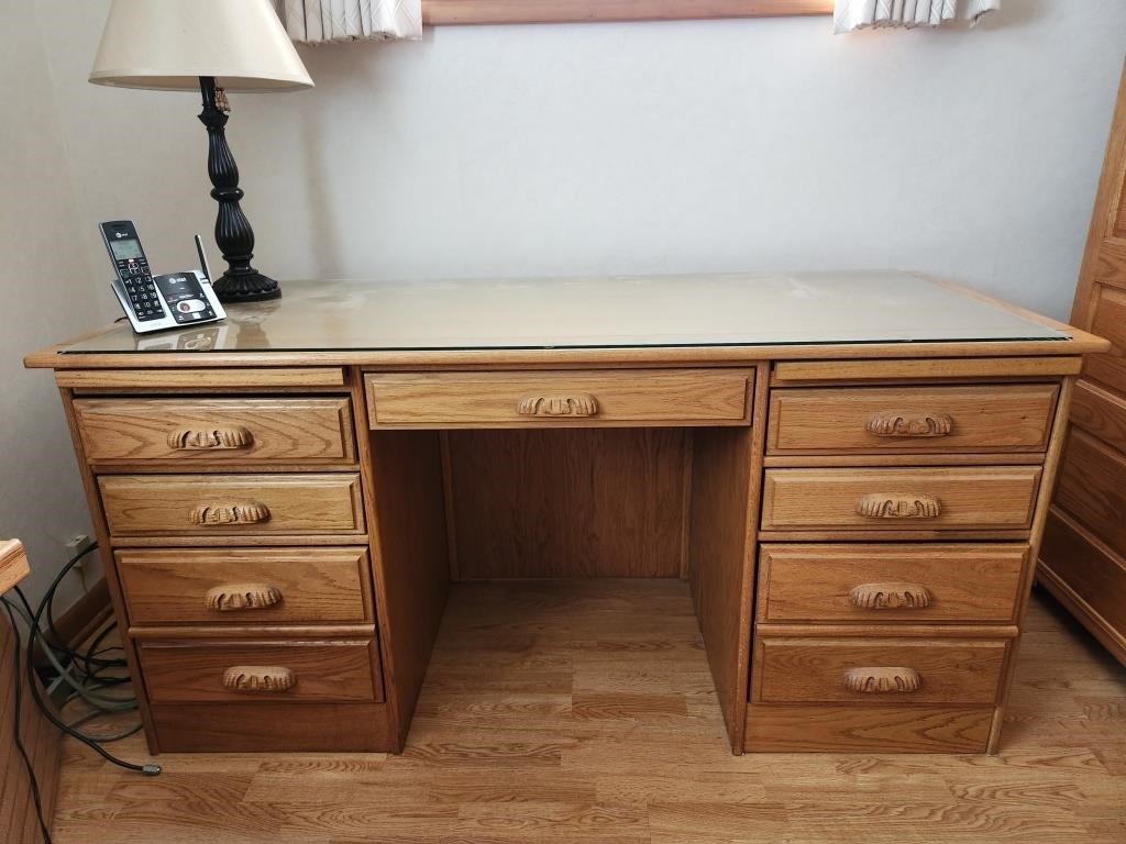 Desk. 26D 62W 30H. Oak look. 2 file drawers. Glass