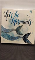 Let's be mermaids wall decor. There is a small