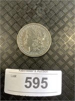 1880-O Rim-encased Morgan Dollar Coin.