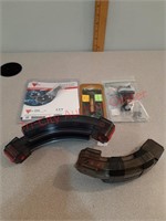Lot of assorted pistol sights and magazines