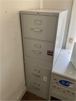 Metal 4 drawer file cabinet. No key