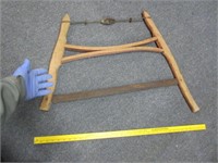 antique buck saw (with faint red paint)