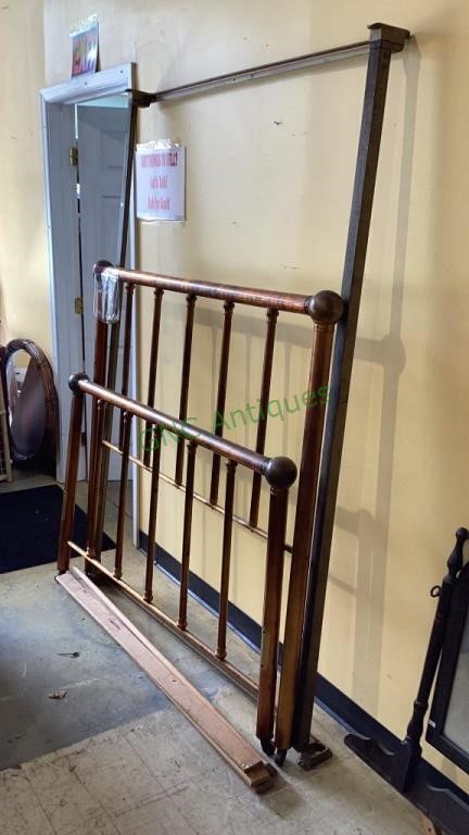 Antique brass-like full sized metal bed with