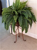 Faux plant in stand