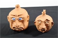 Two Pottery Face Jugs