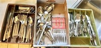 3 groups of stainless flatware