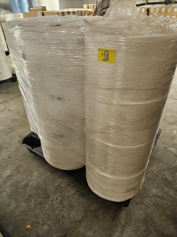 PALLET WITH ROLLS OF WHITE MASK MATERIAL