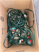 Box of extension cords with red buttons switches
