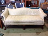 Chippendale style wingback sofa. Good condition.