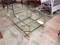 Brass & glass coffee table. 15.25"h x 36"sq