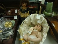 Bisque millennial baby and an antique doll.
