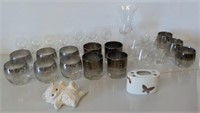 Assortment of glasses and stemmed glasses.