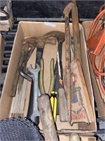 assorted tools including hammers wrenches and