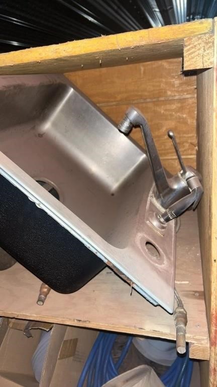 3 metal industrial sinks and ductwork