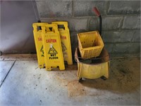 3 wet floor signs & mop bucket