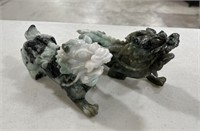 Two Jade Carved Foo Dog Sculptures