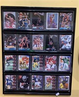 Frame with 20 sports cards - basketball, football