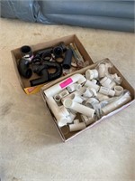 Two boxes of plumbing and brass fittings
