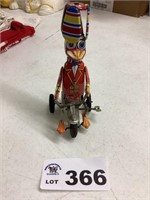 TIN WIND-UP DUCK ON TRICYLE TOY