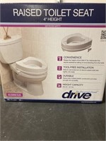 Raised toilet seat- new never used