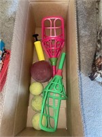 Wiffleball rackets, air pump, tennis balls