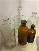 5 vintage bottles - four are cork top, two amber