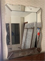 Large ornate wall mirror with etching