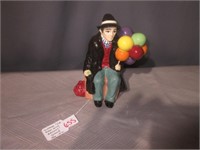 vintage balloon man statue .