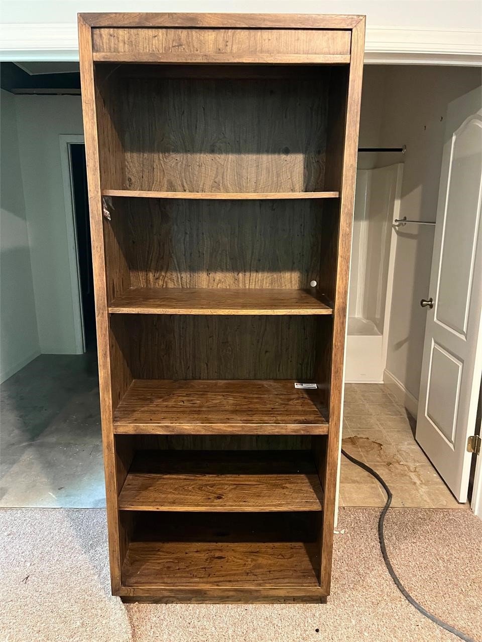 Large bookshelf with fixed shelves