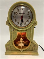 Vintage Bake-lite swinging girl clock