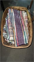 Basket with a variety of carpets