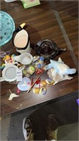 Assortment of cups and figurines
