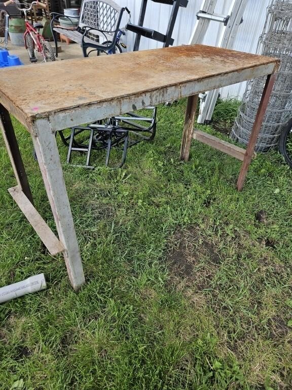 Table- has some rust, discoloration