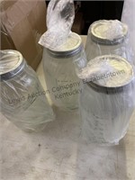 Four half gallon jars