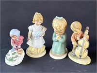 4 vintage hand painted porcelain figurines
